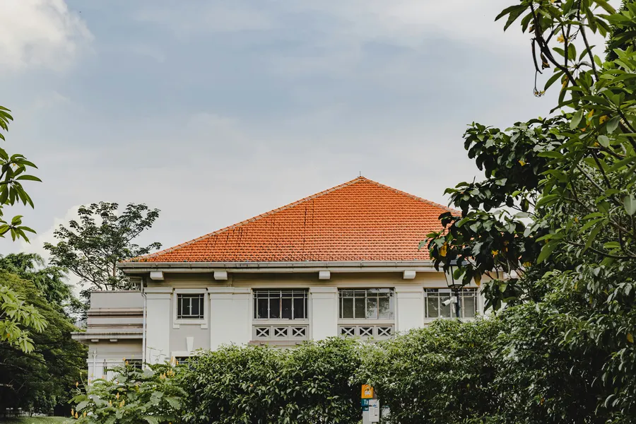 Orange tile roof on a white rendered house